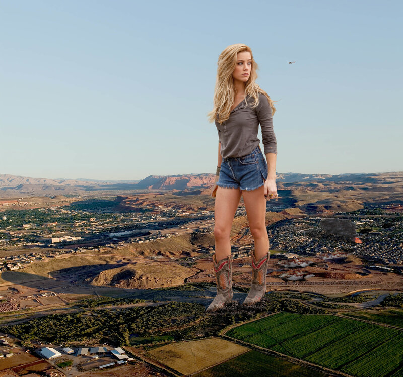 giant woman in desert landscape