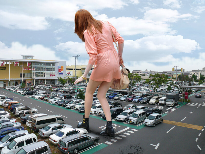 giant woman in parking lot
