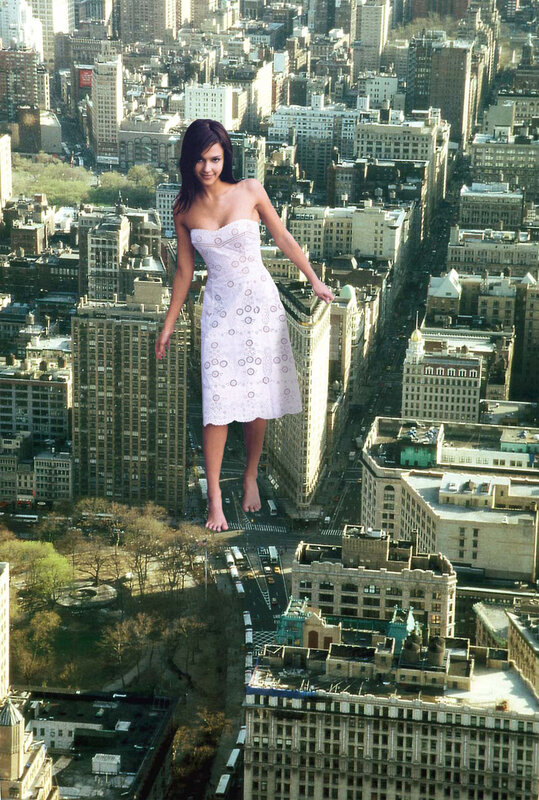 giant woman over city