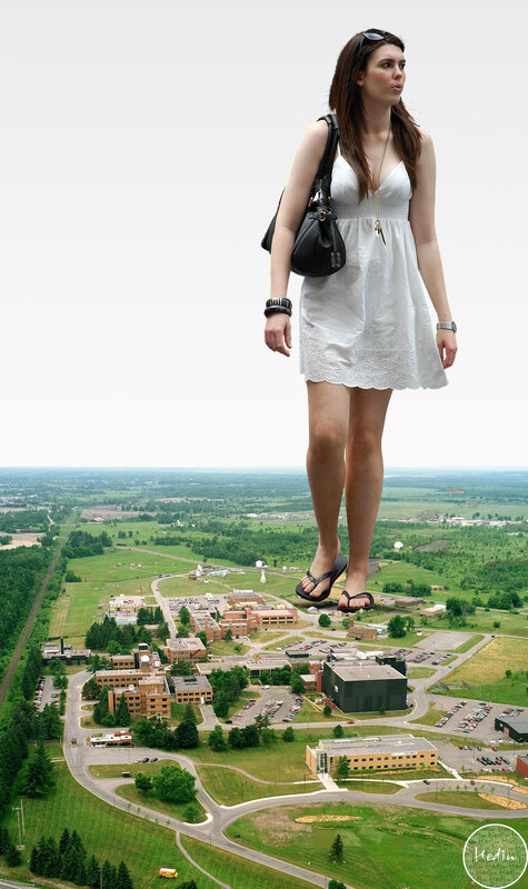 giant woman overlooking campus