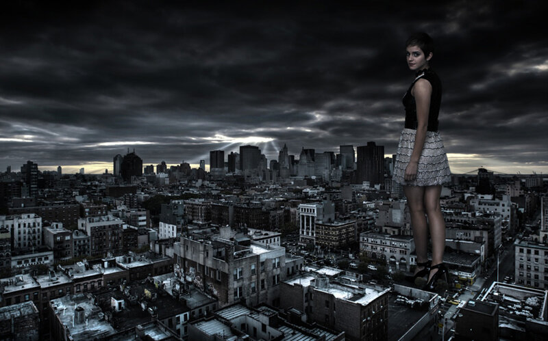 giant woman overlooking city