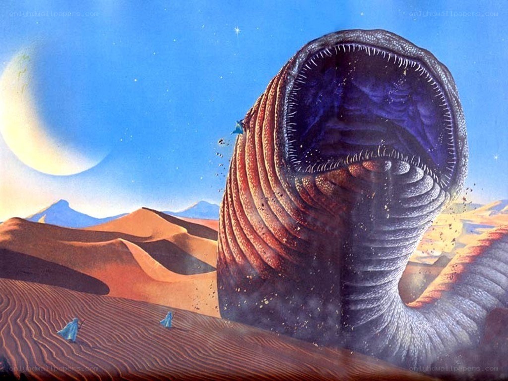 giant worm in desert landscape