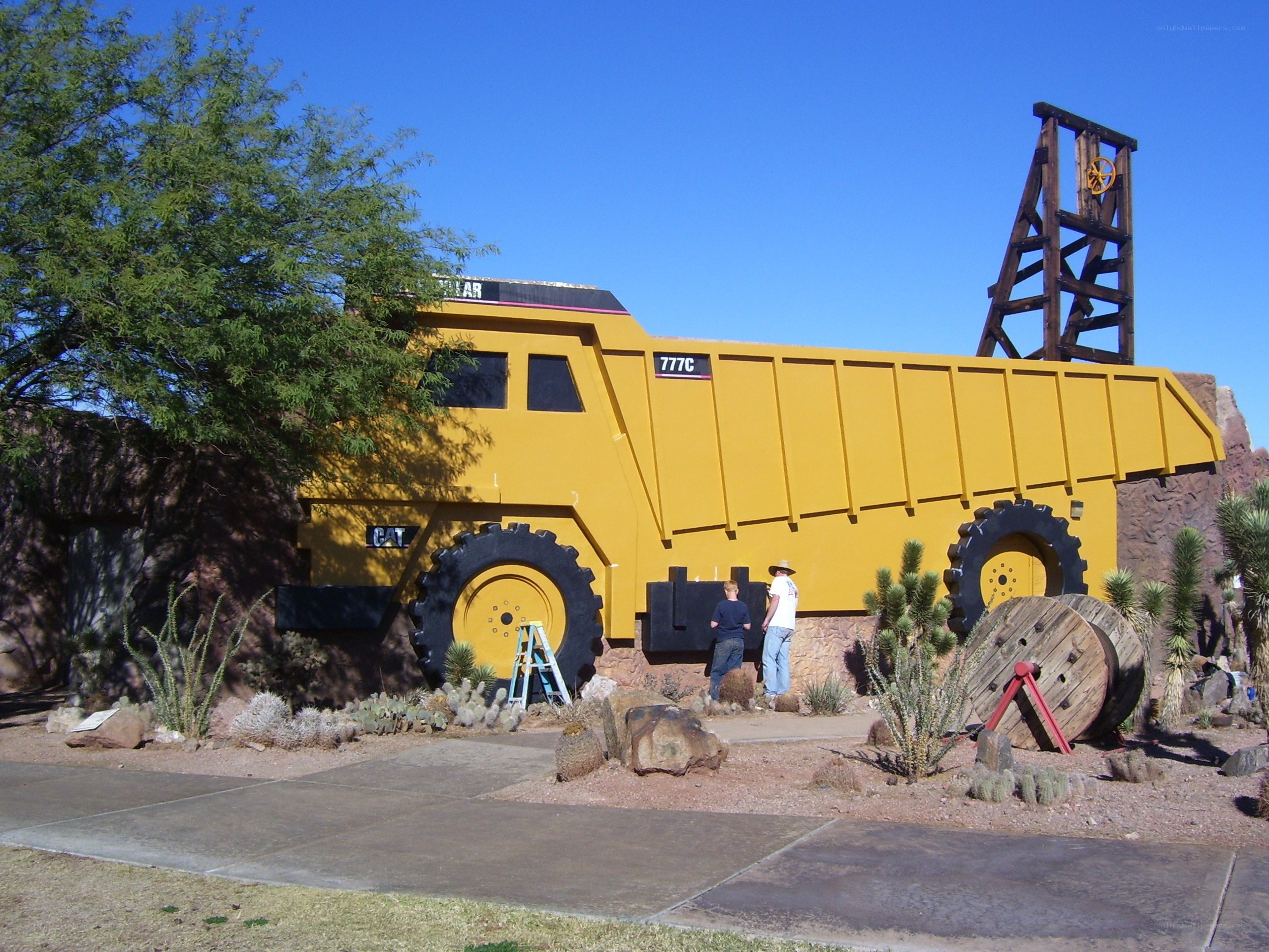giant yellow mining truck display