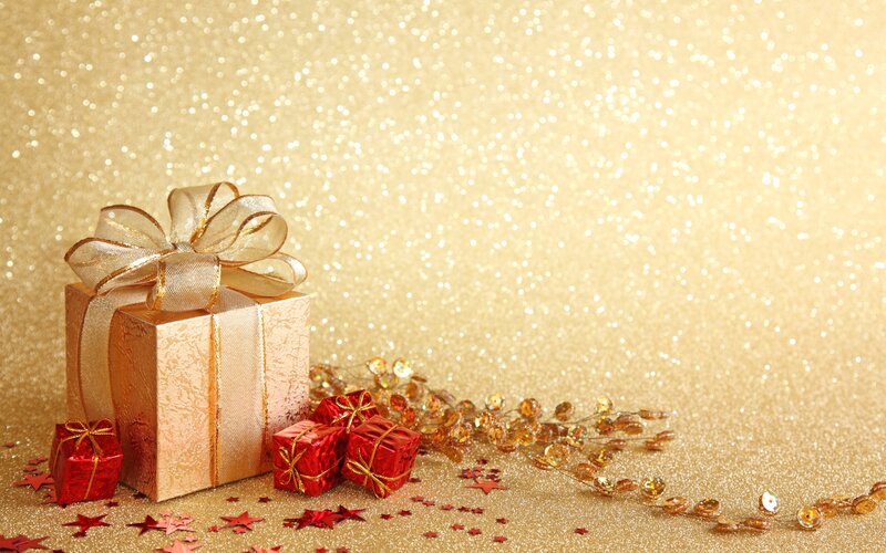 Gift Boxes on Gold Background