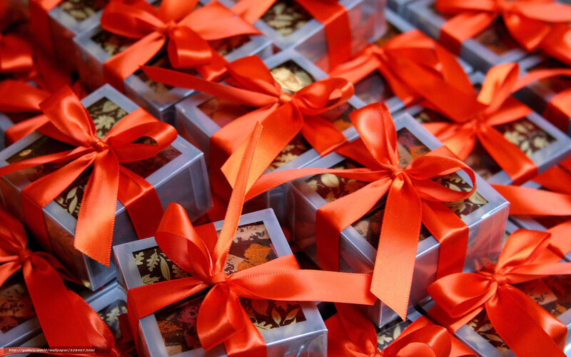 Gift boxes with red ribbons