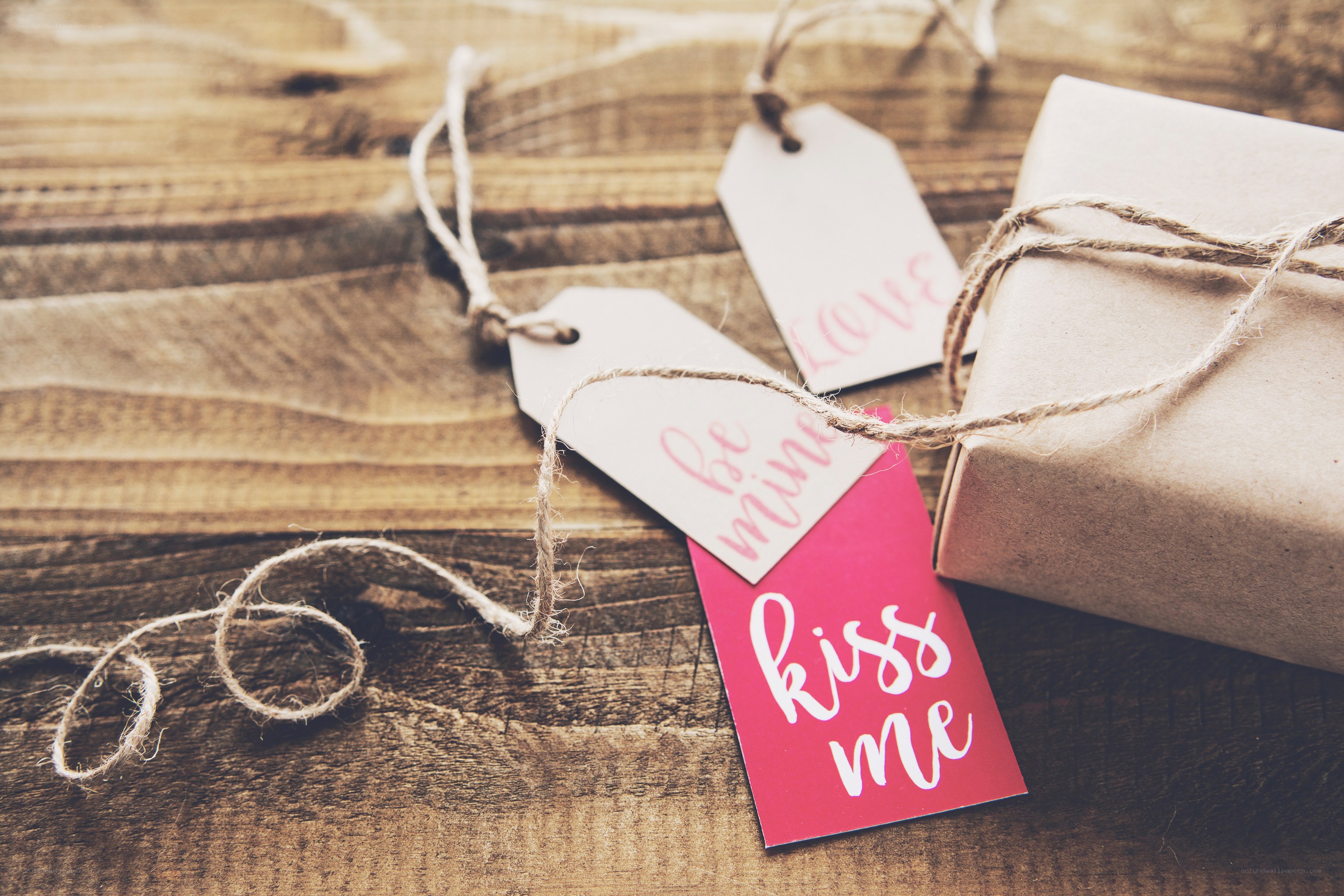 gift tags on wooden surface