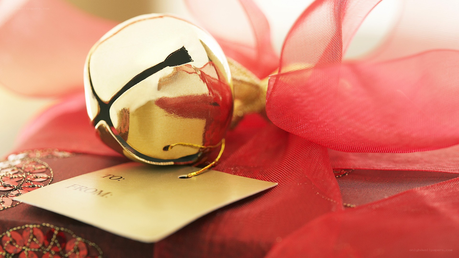 Gift with bell and ribbon