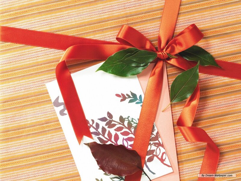 Gift with Ribbon and Leaves