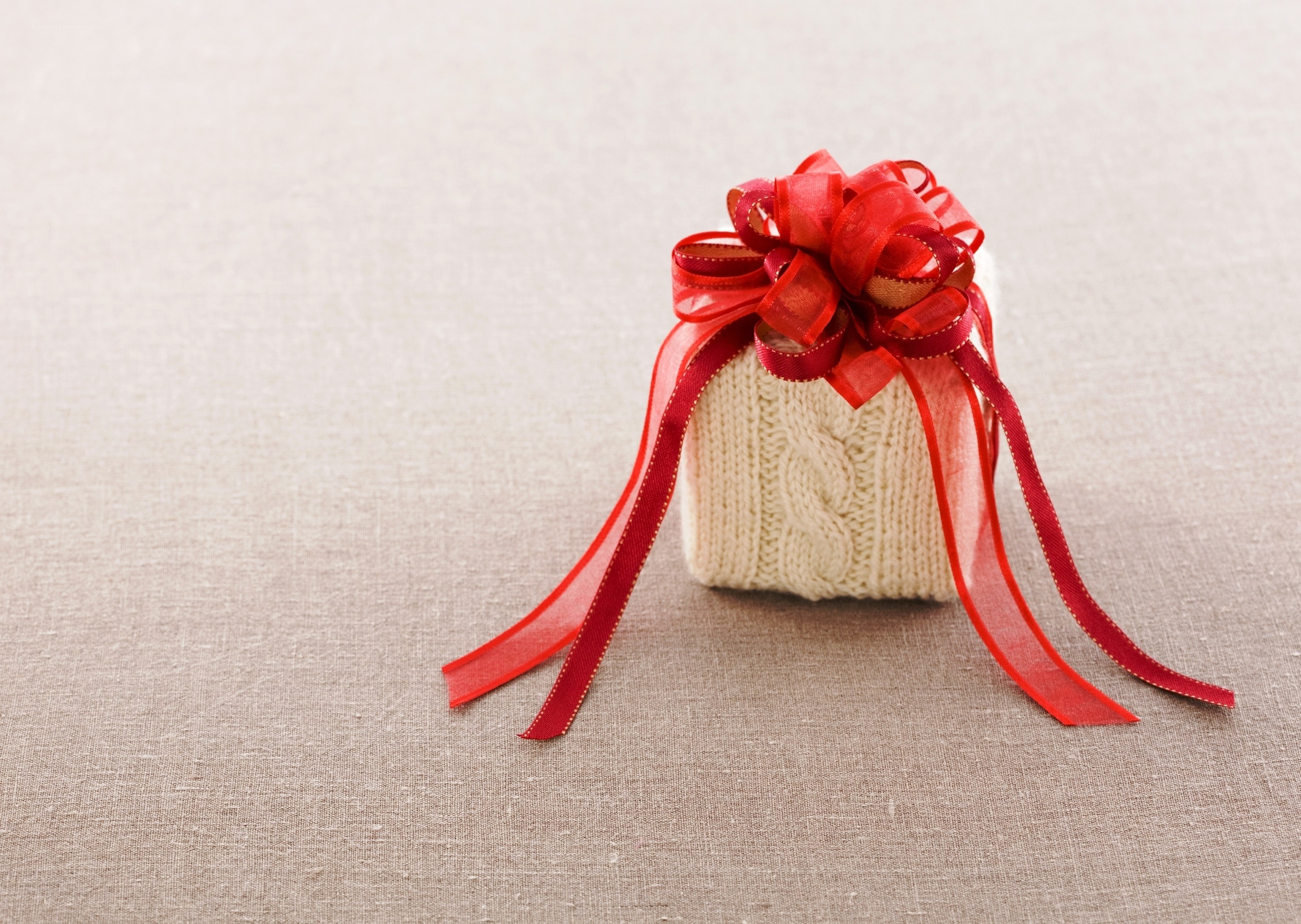 gift wrapped in knit sweater