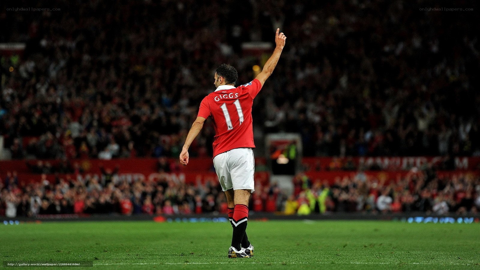 Giggs celebrates on the pitch