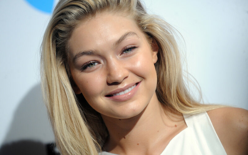 Gigi Hadid smiling at event