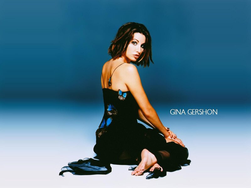 Gina Gershon in black dress
