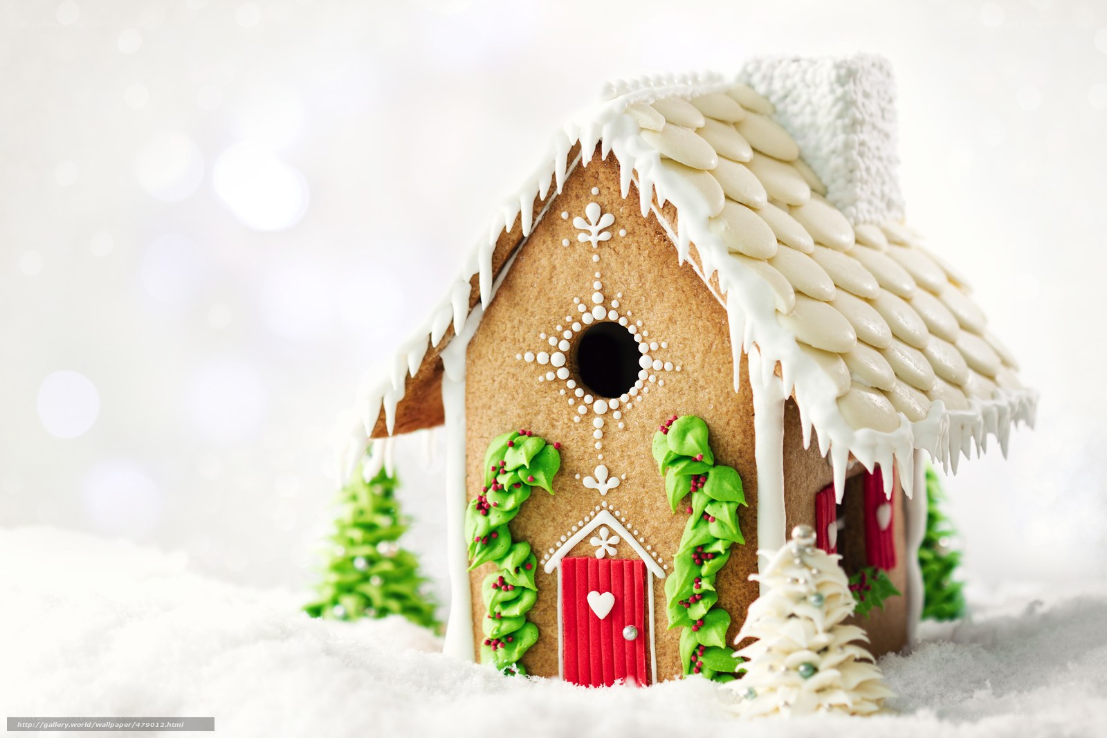 Gingerbread house in snow
