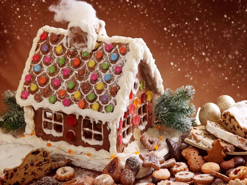 Gingerbread house with holiday treats