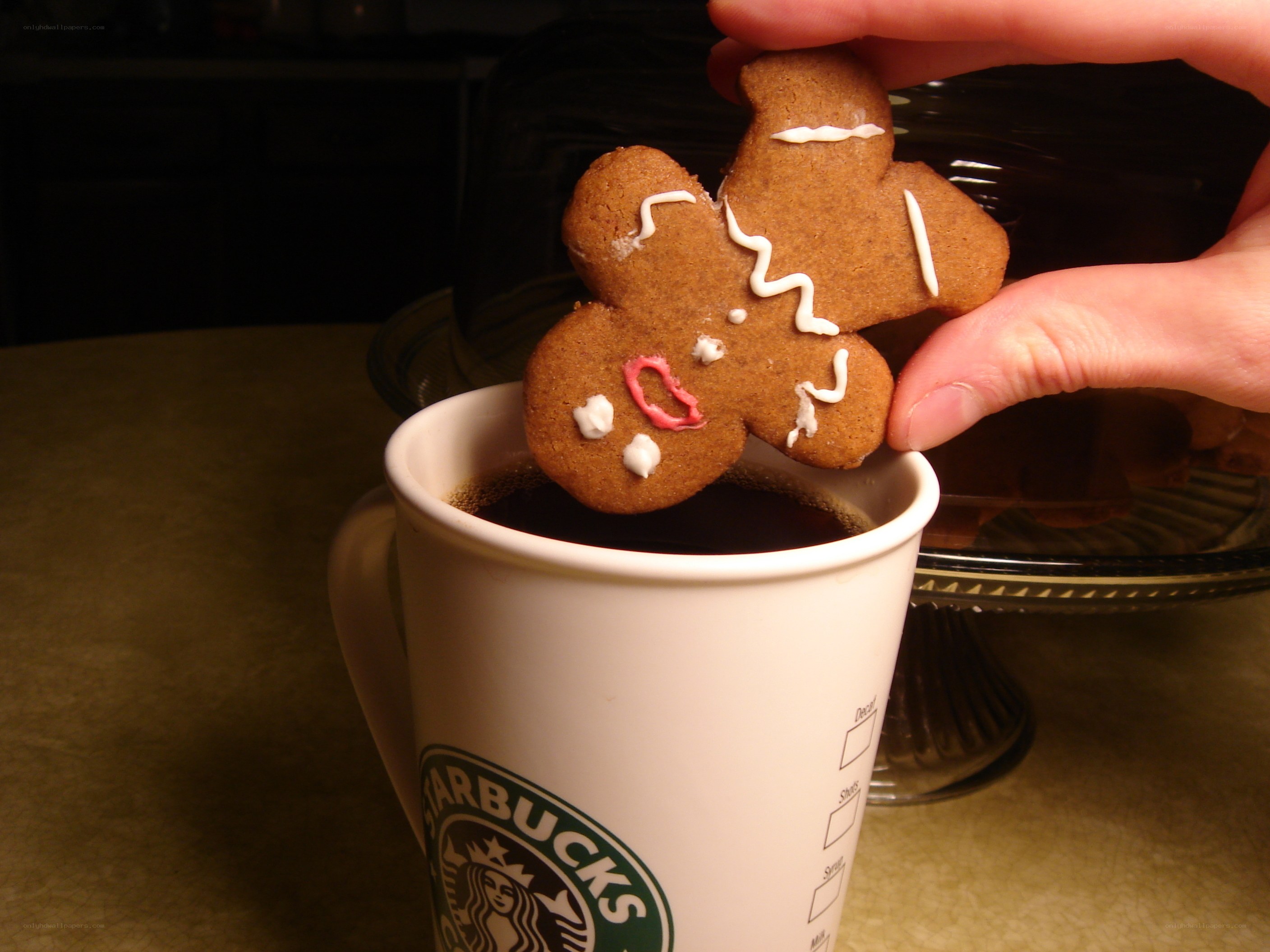 Gingerbread man in coffee