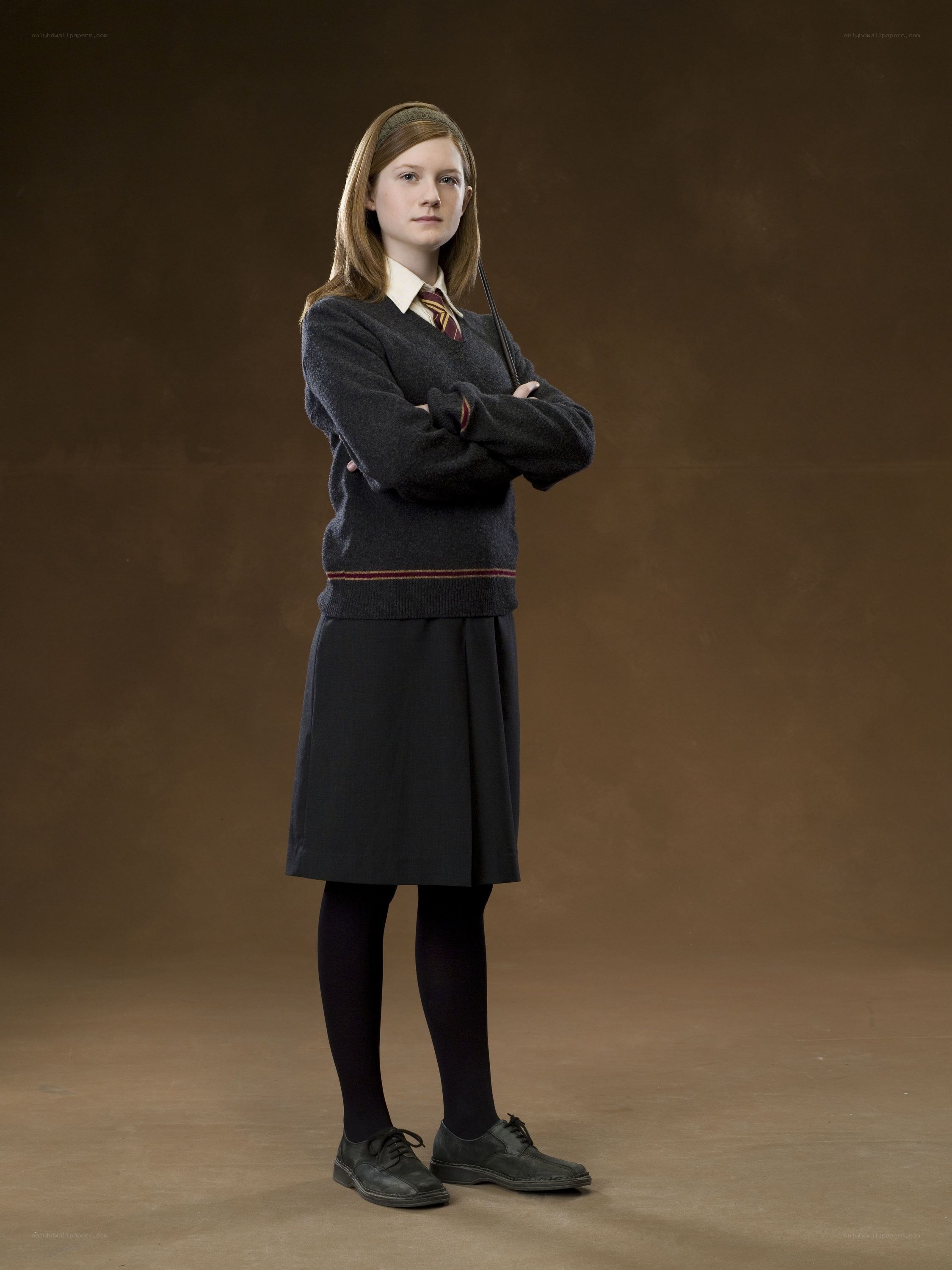 Ginny Weasley in school uniform