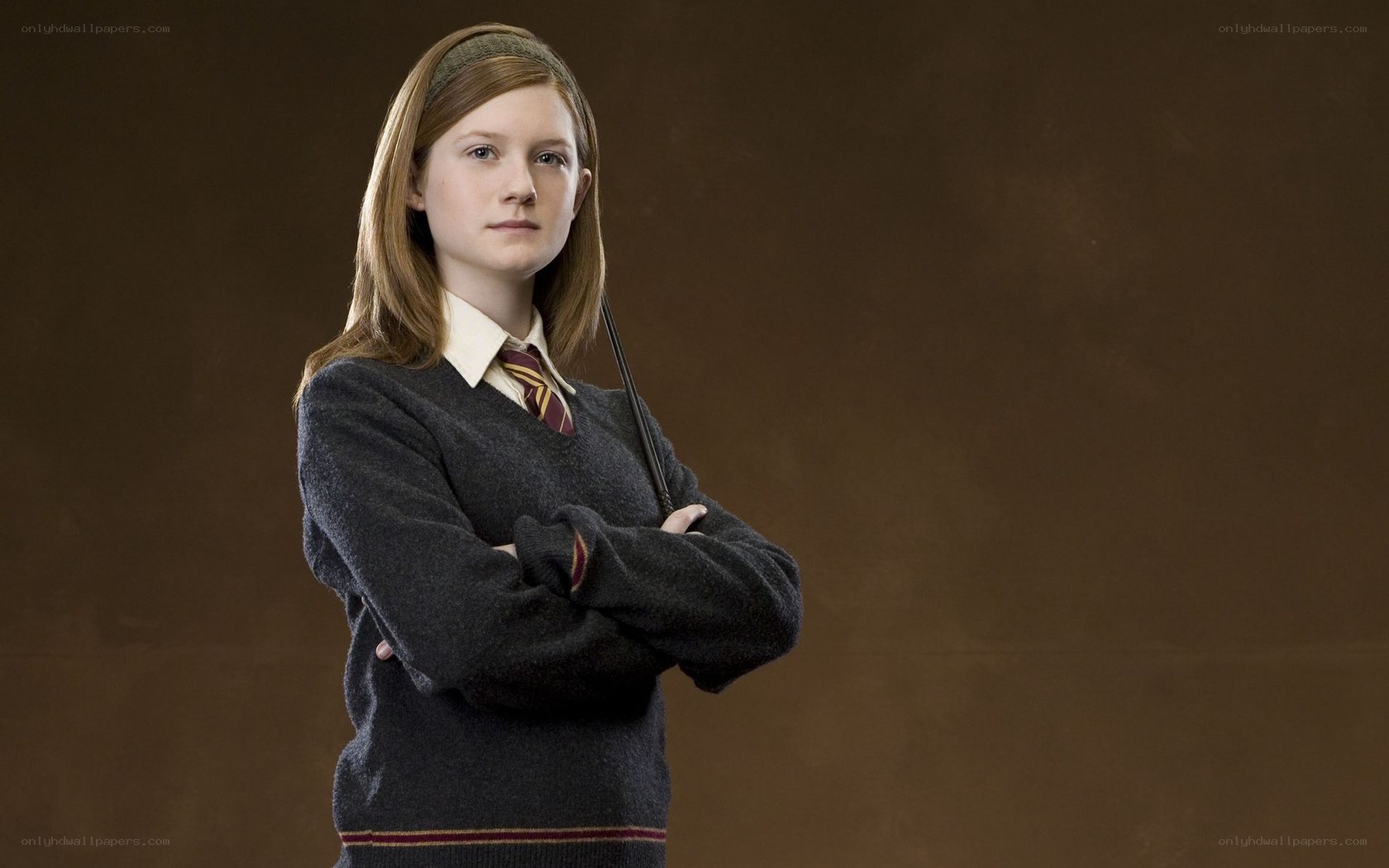 Ginny Weasley in school uniform