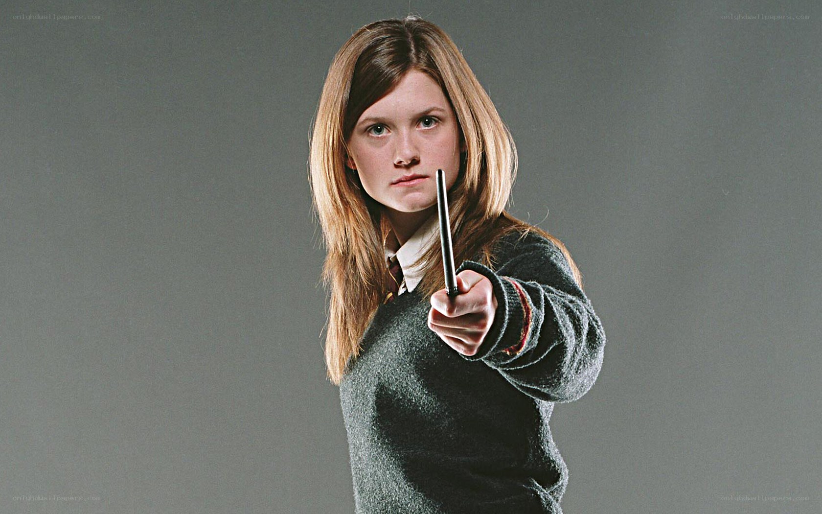Ginny Weasley with wand