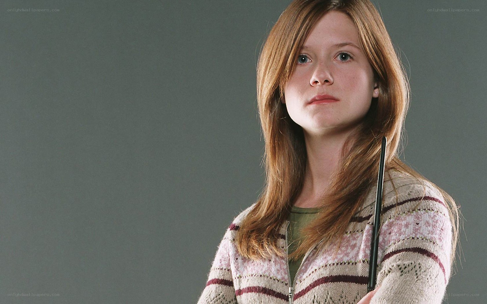 Ginny Weasley with wand