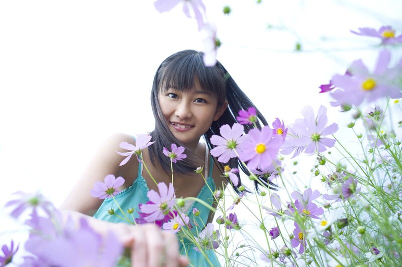 girl among purple flowers