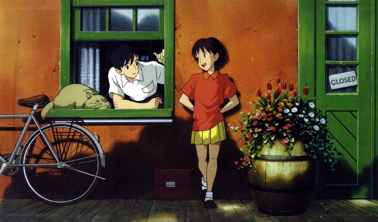 girl and boy by a house