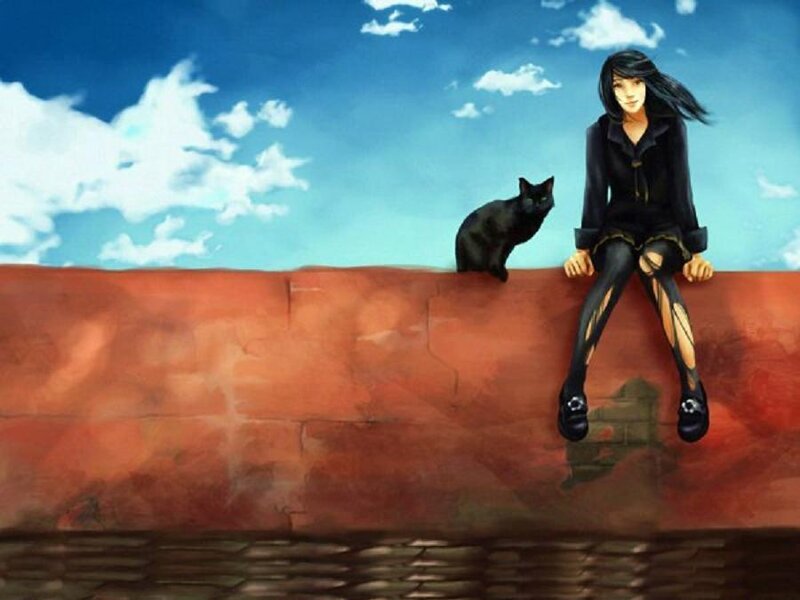 girl and cat on a wall