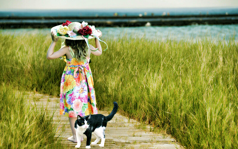 Girl and Cat on Boardwalk