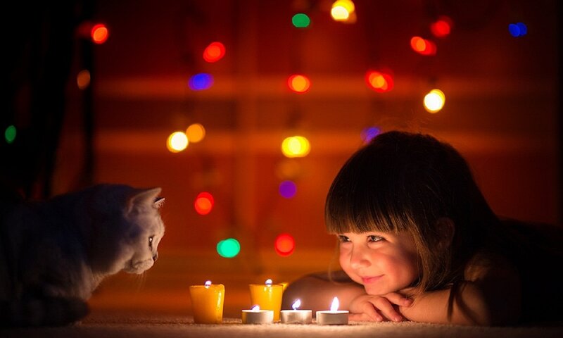 Girl and Cat with Candles