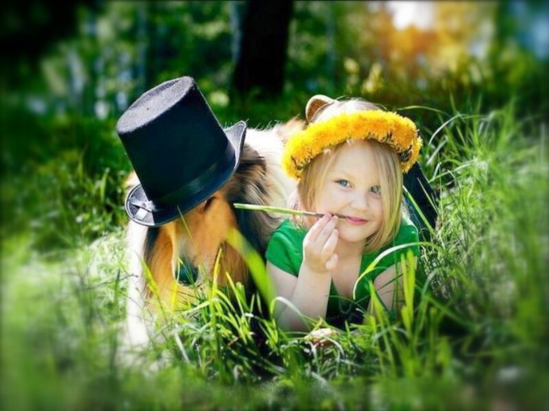Girl and Dog in Grass
