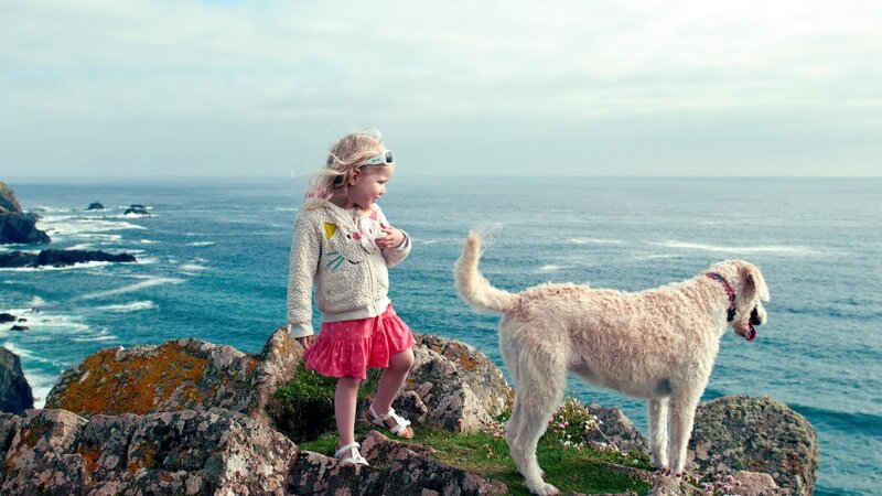 Girl and Dog on Cliff — Blue