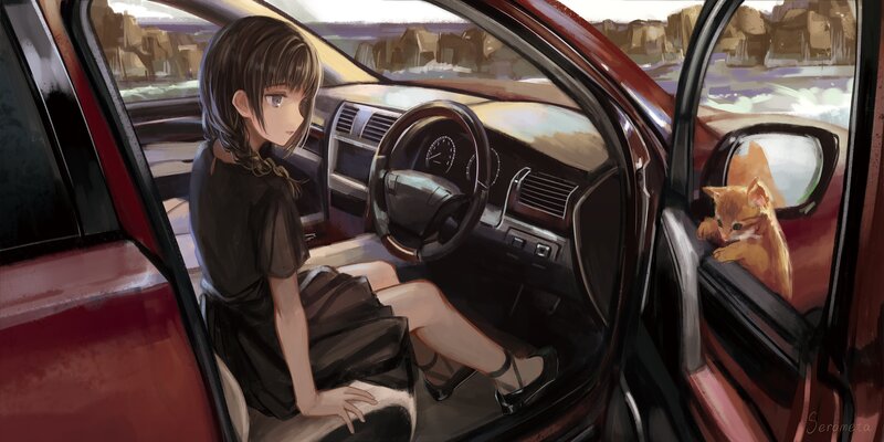 Girl and Kitten in Car