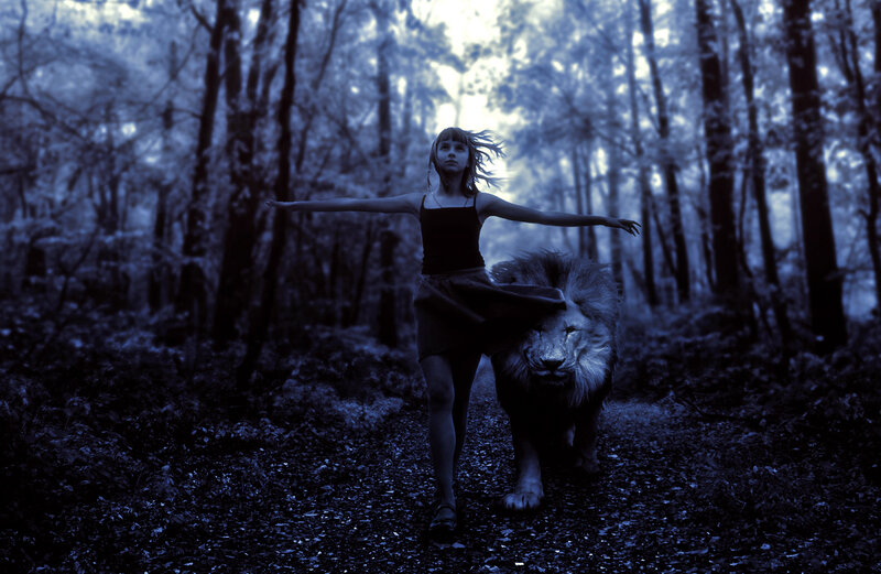 Girl and Lion in Forest