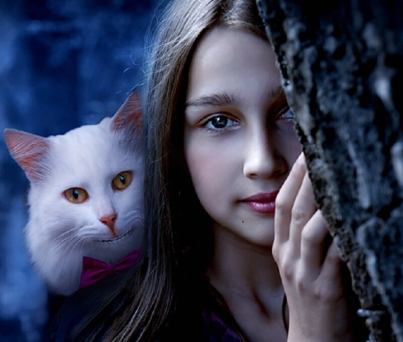 girl and white cat in forest