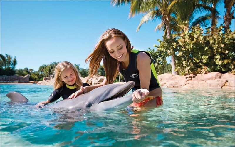 Girl and Woman with Dolphin