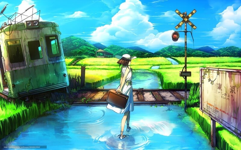 Girl at a flooded railway crossing