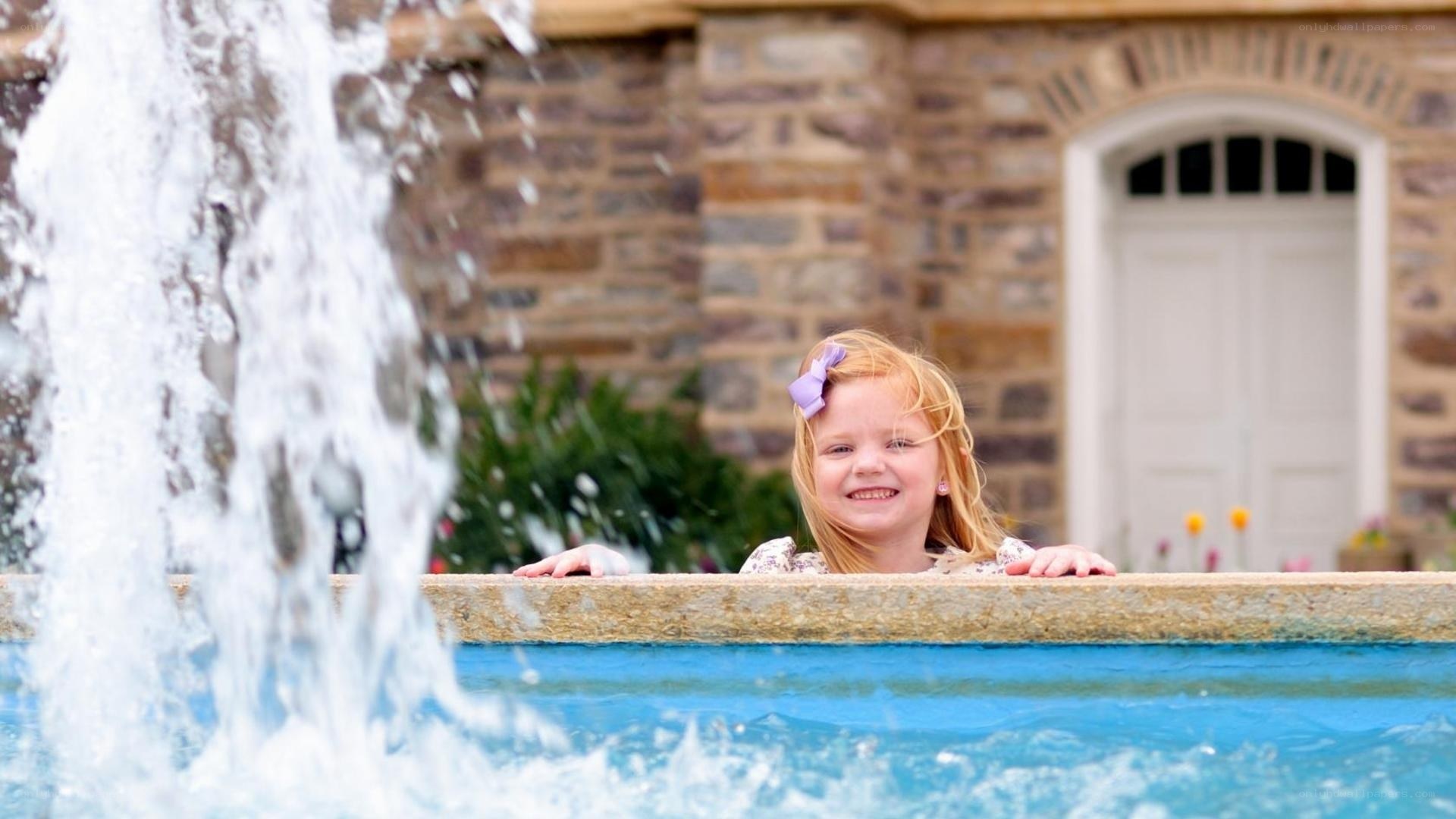 girl at a fountain