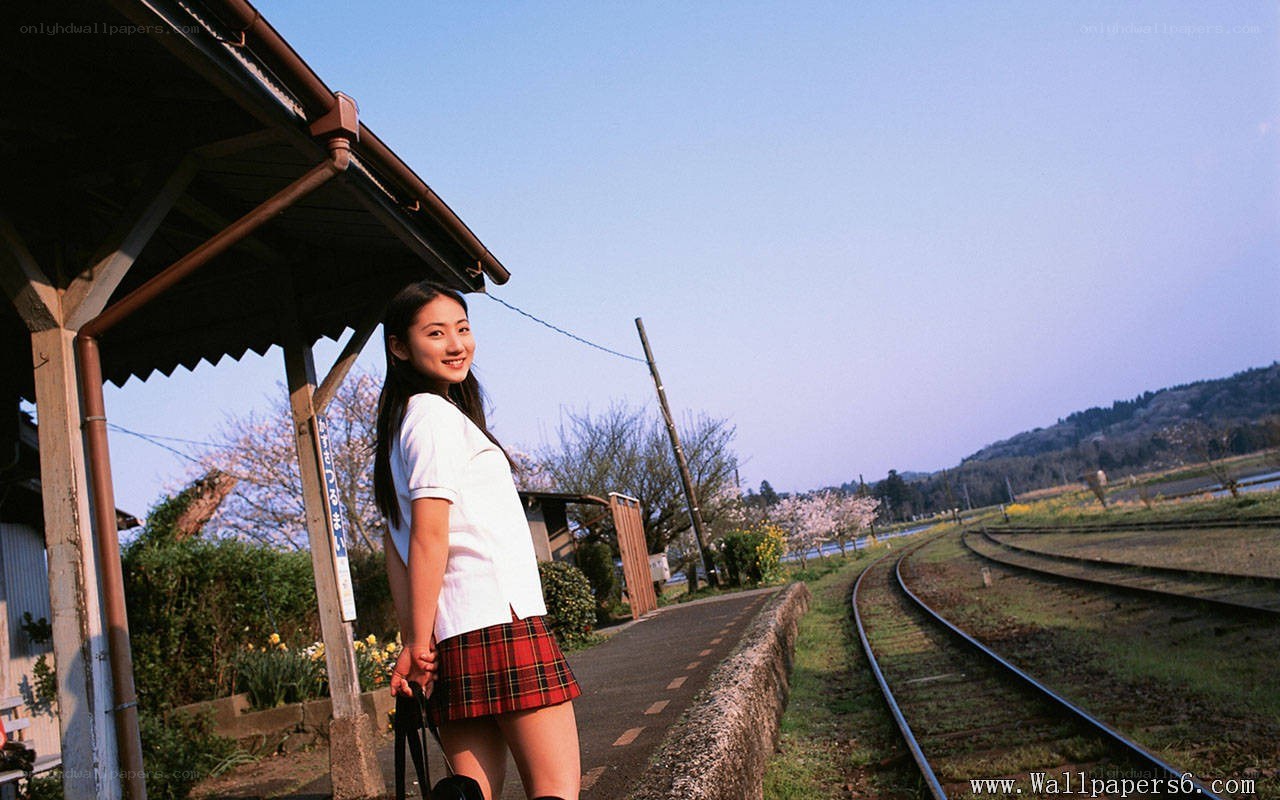 Girl at a train station