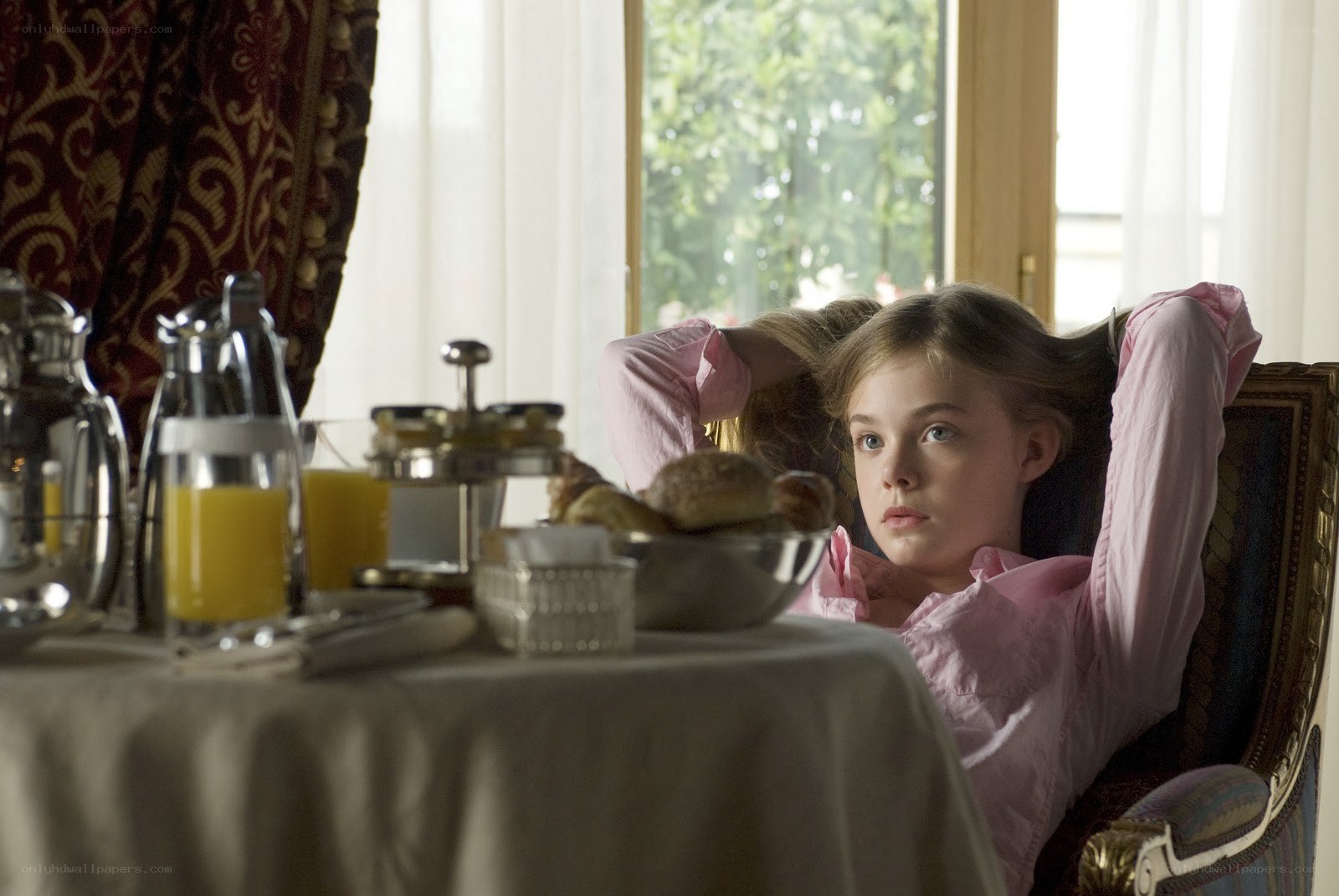 Girl at breakfast table