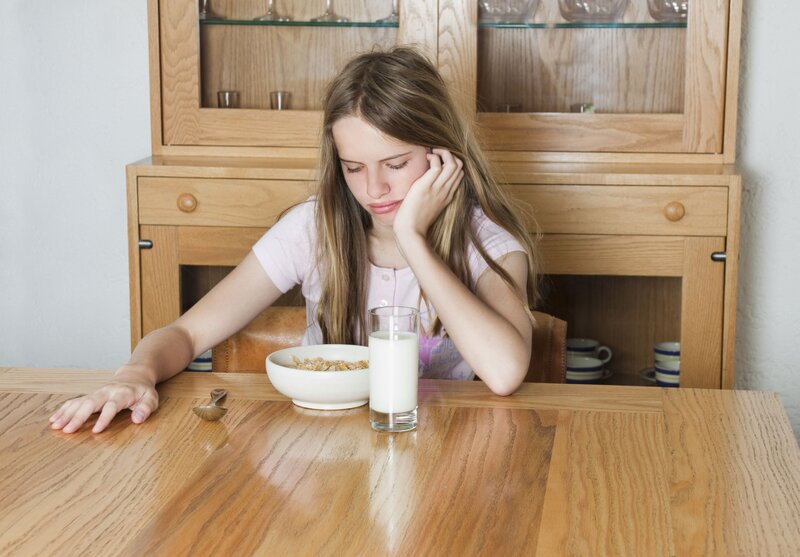 Girl at Breakfast Table — Brown
