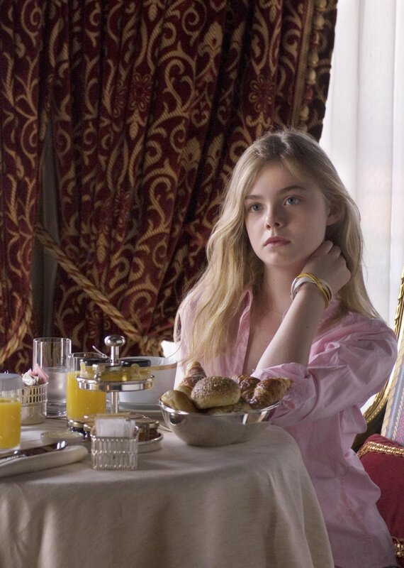 girl at breakfast table
