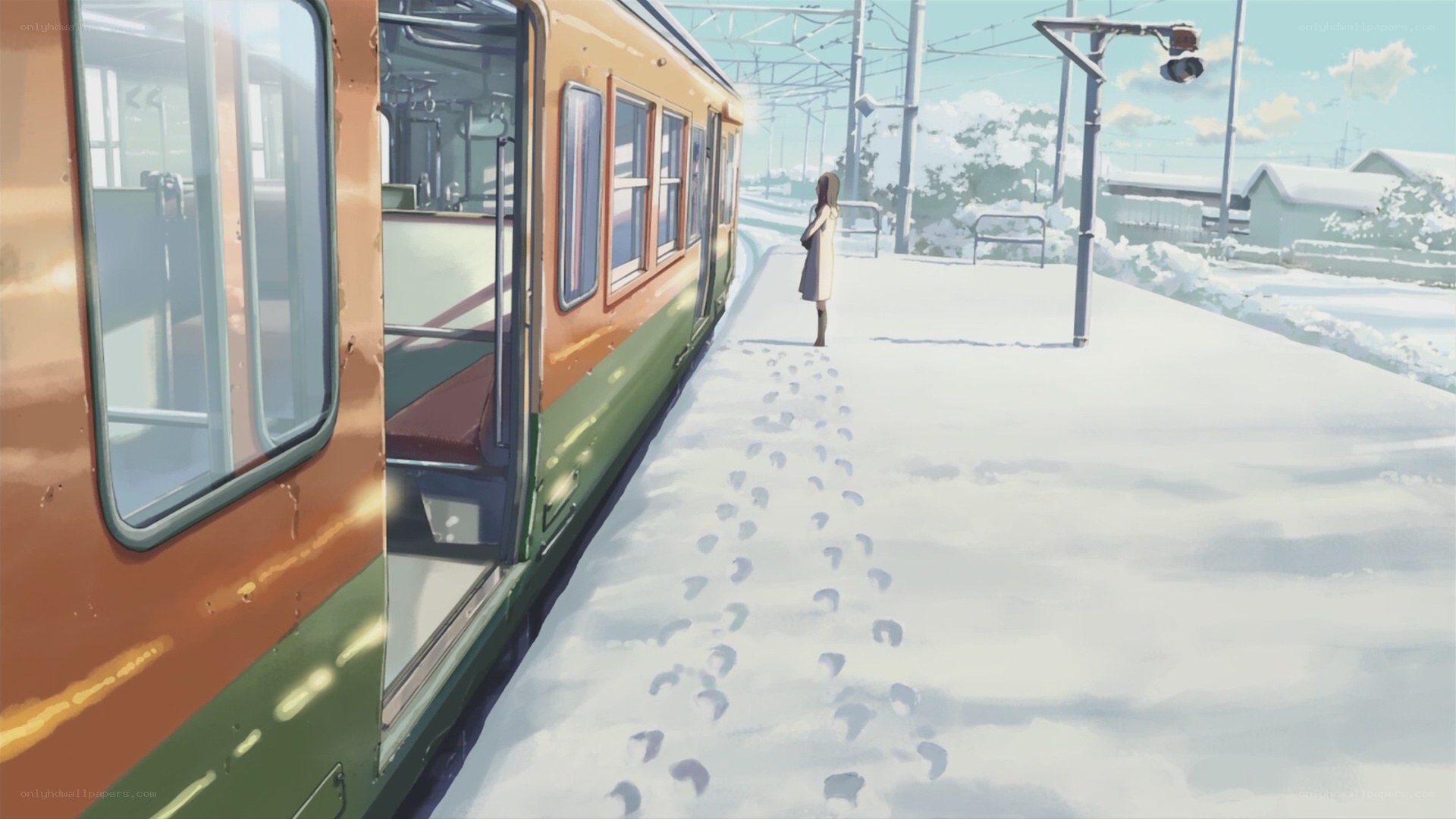 Girl at snowy train station