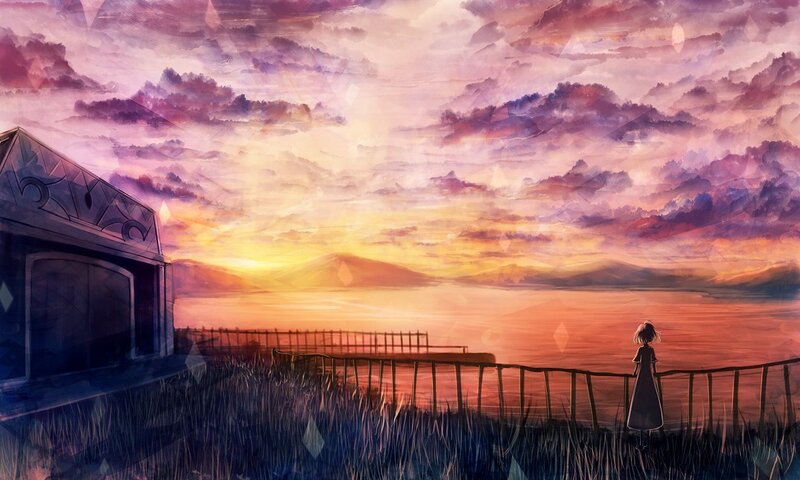 Girl at sunset by the water