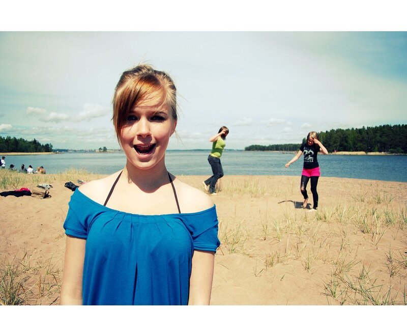 Girl at the beach with friends