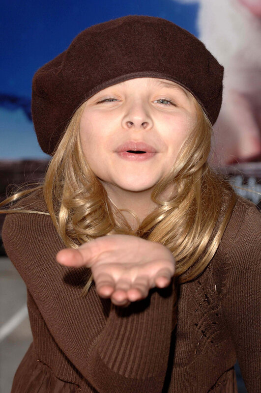 girl blowing a kiss