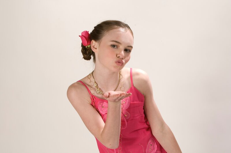 girl blowing a kiss