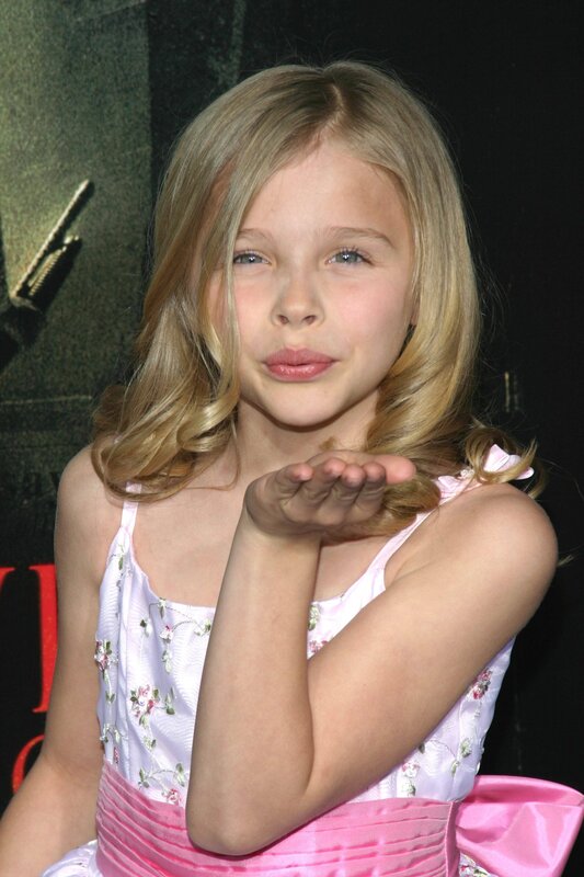girl blowing a kiss