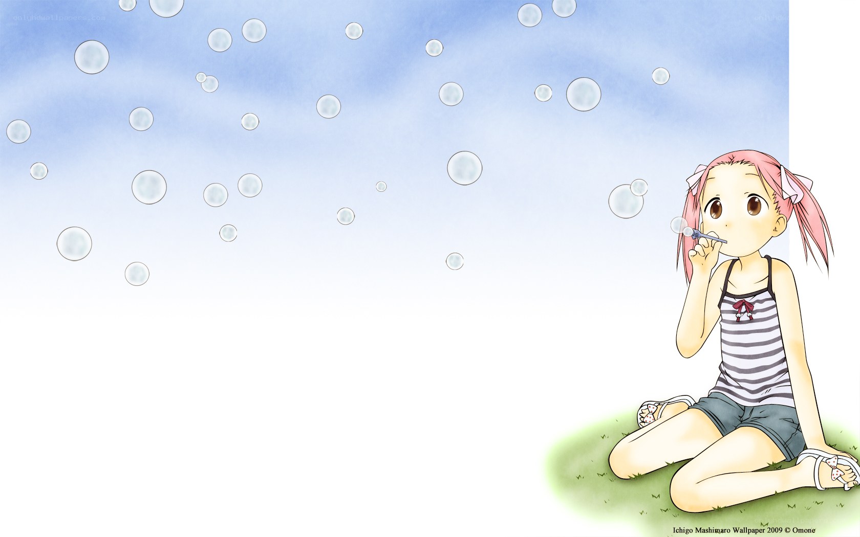 girl blowing bubbles