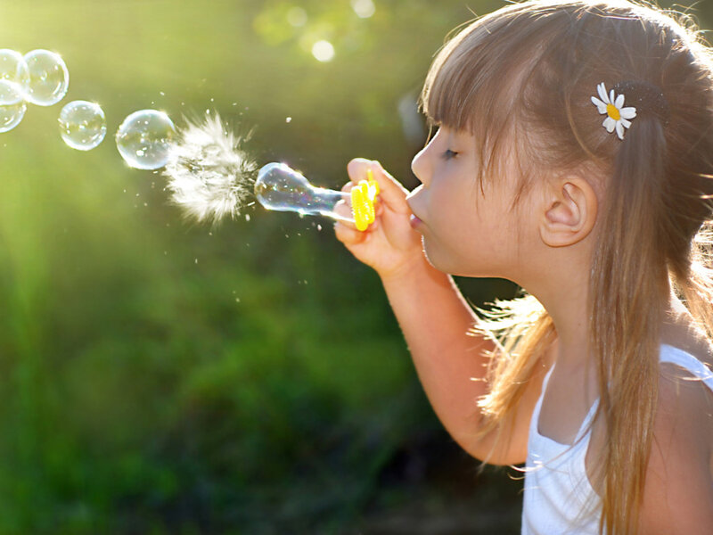 Girl Blowing Bubbles — Green, Serene, Afternoon, Photograph