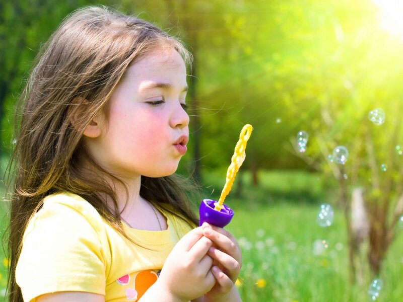 Girl Blowing Bubbles — Yellow