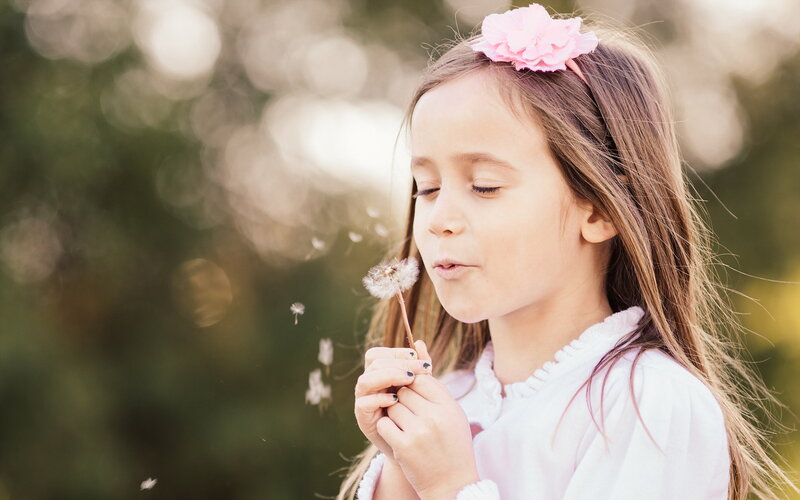 Girl Blowing Dandelion — Pink